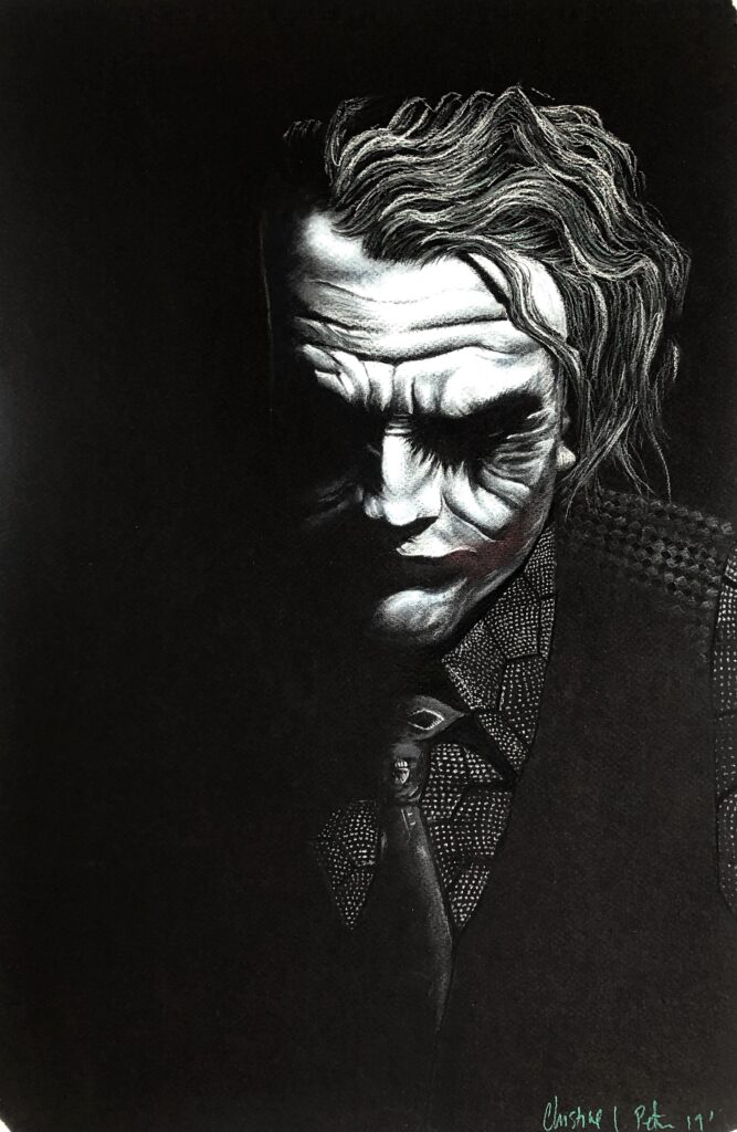 Balck and white pastel drawing of the joker from Batman