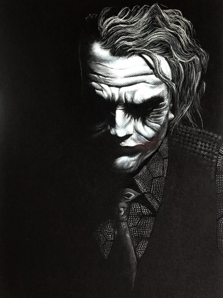 Balck and white pastel drawing of the joker from Batman