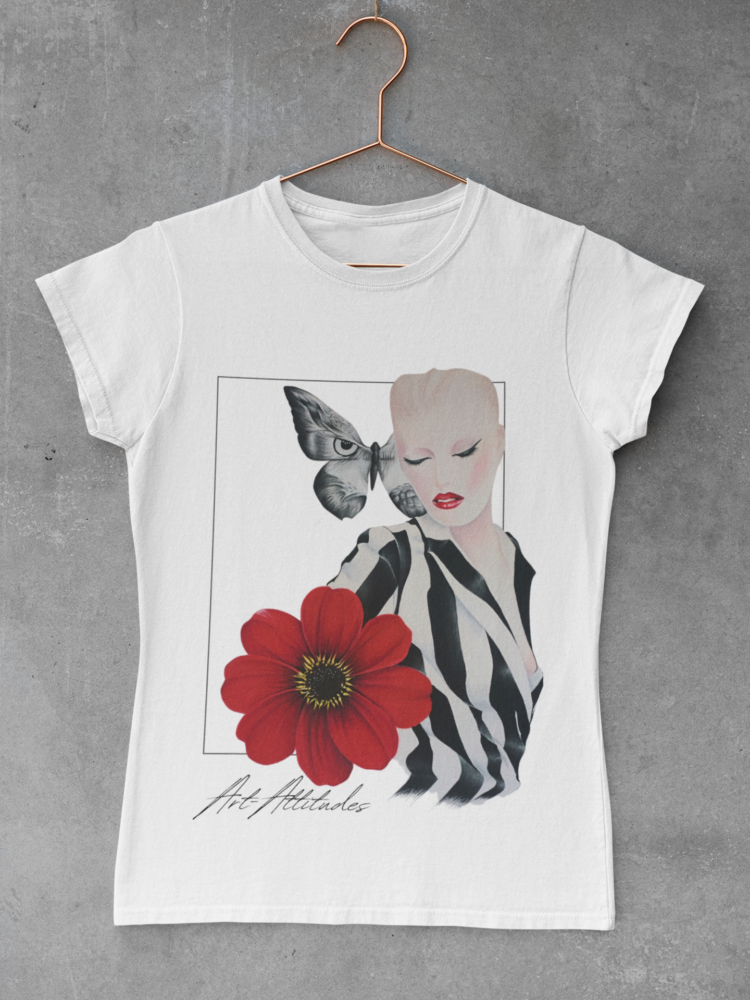 white t-shirt with a motive of a woman in a balck and white striped shirt and a big red flower on her right side and a big butterfly next to her head