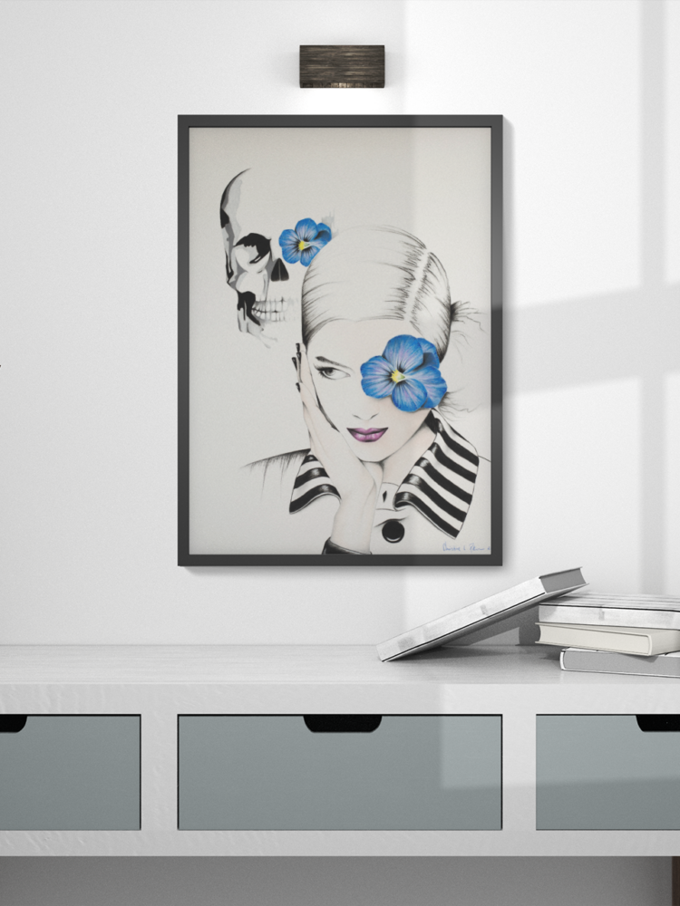 Pastel drawing of woman with blue flower in frent of her left eye in a white shirt with a striped collar and a skull in the bagground with a blue flowe on it's left eye in a black frame hanging on the wall with a white table under it.