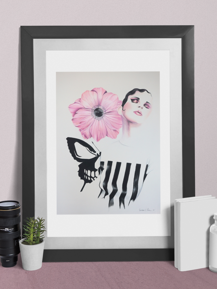 Pastel drawing of a woman in a black and white striped shirt looking up with a pink flower next to her head and a skull butterfly behind her back in a black frame stading on a puelpe shelf